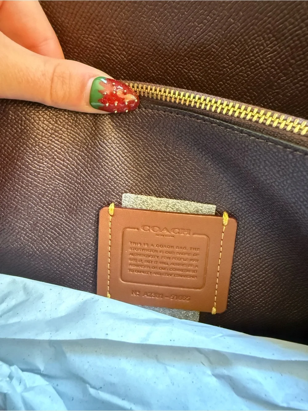 Coach Charlie Carryall 28 in Signature Embossed Leather